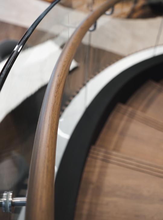 Onewood Spiral Staircase Tread and curved handrail